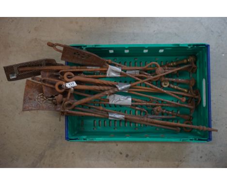 A large collection of fireside tools to include tongs, shovels etc.. 