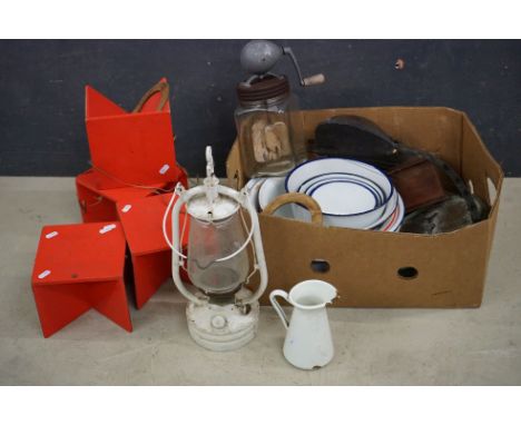 A box of mixed collectables to include enamel plates, Tilly lamp and coffee grinder..etc. 