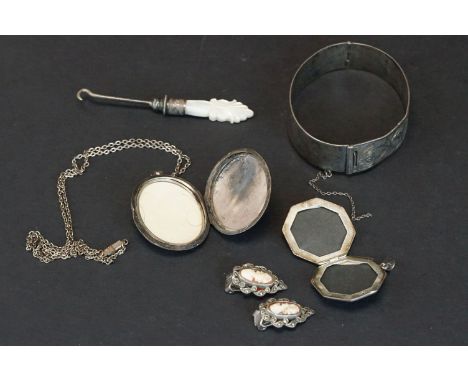 A collection of sterling silver jewellery to include a bangle, earrings, locket..etc. 