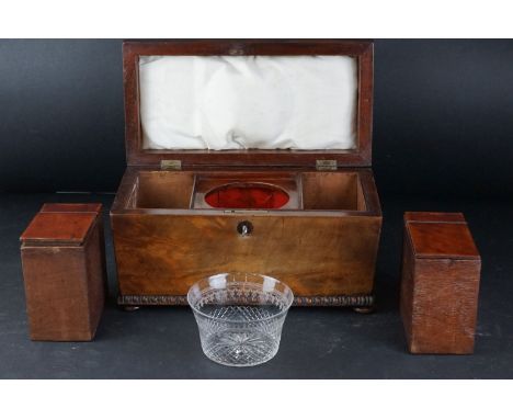 Early 19th century Sarcophagus Walnut Tea Caddy, the hinged lid opening to two lidded compartments and a mixing well, raised 
