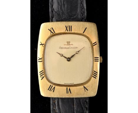 Jaeger LeCoultre: an 18k wristwatch, with circular dial, the shaped rectangular outer case marked with roman numerals, the ba