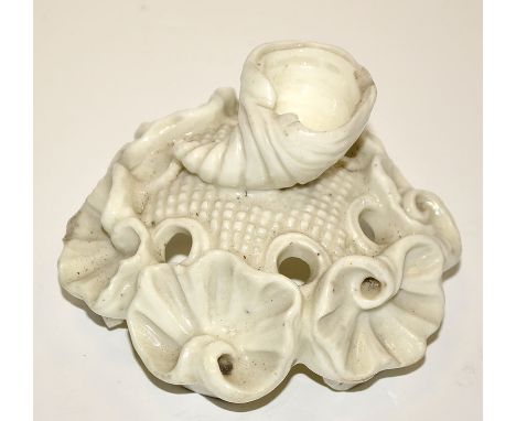 White glaze porcelain cover, the sides and finial of shell form, probably 18th Century, height 6cms.