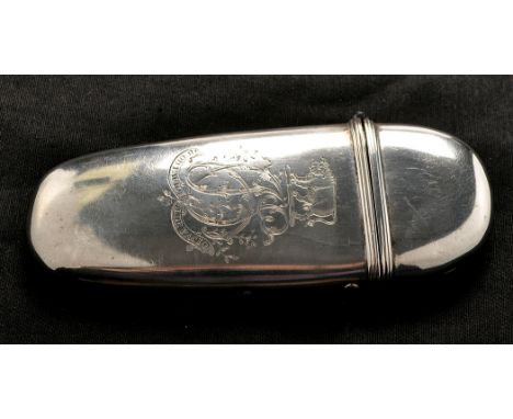 A 19th Century white metal spectacles case, probably French, of elongated oval form, engraved with the Sikes crest, monogram,