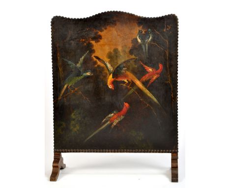 An early 20th Century firescreen, painted in oils on stretched leather, a garden scene with mother and daughter gathering flo