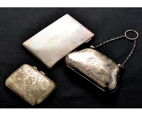 A George V silver purse, by Walker & Hall, Sheffield 1910, engraved initials, 4 1/2in. (11.5cms); a George V cigarette case, 