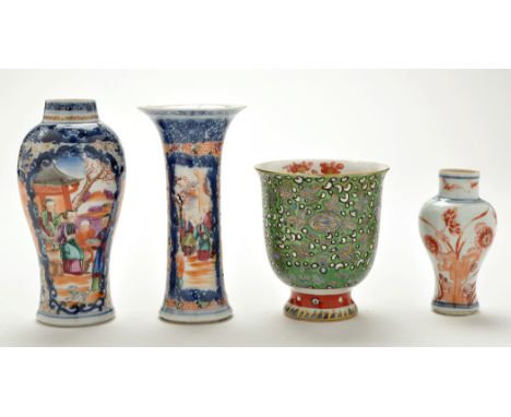 Two small Famille Rose vases, of inverted baluster and trumpet form painted with figures in the Mandarin style, height 14 and