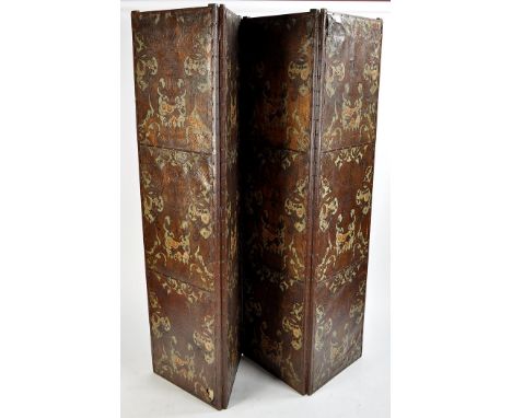 A large 19th Century painted and embossed leather double sided four-fold screen, decorated with flowers, vases and scrolls on