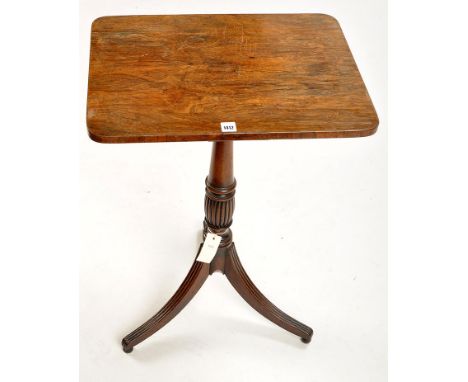 A 19th Century rosewood occasional table with rectangular top, raised on a turned and reeded column with reeded tripod legs a