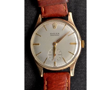 A 9ct. yellow gold cased Rolex precision wristwatch, baton dial and subsidiary seconds aperture, manual wind mechanism, brown