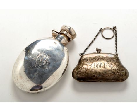 A George V silver hip flask, by Reid & Sons, Birmingham 1924, oval, engraved inscription and monogram, 5 1/4in. (13.5cms); an