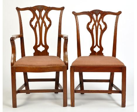 A Harlequin set of six single and two arm Chippendale style mahogany dining chairs, all with serpentine cresting rails and pi