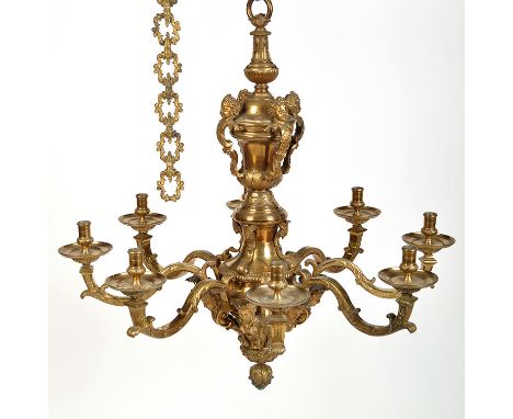 A French Louis XIV style ormolu eight-branch chandelier in the manner of Andre Charles Boulle, the suspension ring above urn-