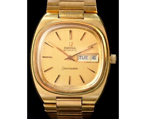 Omega Automatic Seamaster Day-Date: a gentleman's gold plated and stainless steel wristwatch, with baton dial, flexible strap