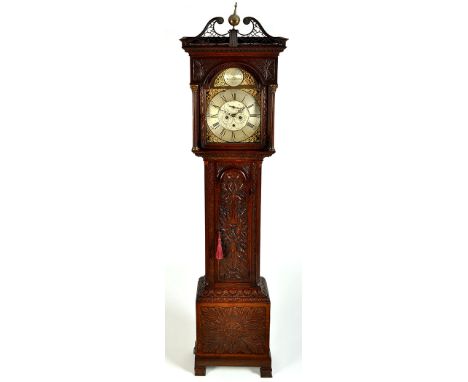 Hugh Stockell, Newcastle: a late Georgian oak longcase clock, the arched brass dial with silvered roman chapter ring and orna