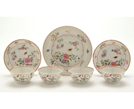 Chinese Famille Rose part tea service, comprising: two tea bowls and saucers, two additional tea bowls and single saucer dish