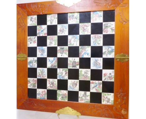 CHESS SET. Wood cased Oriental style chess set with complete cast resin pieces