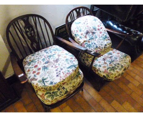 ERCOL ARMCHAIRS. Pair of Ercol Prince Of Wales low armchairs