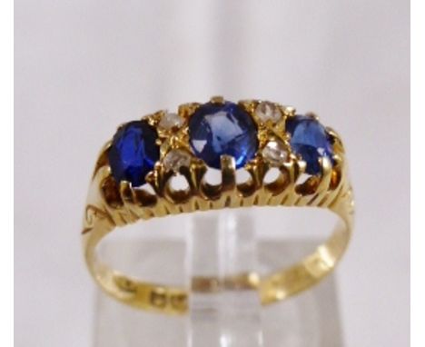 18CT DIAMOND RING. 18ct antique gold sapphire and diamond ring, size M