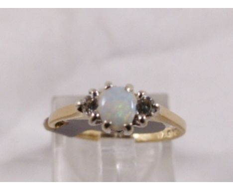 9CT OPAL AND DIAMOND RING. 9ct gold opal and diamond ring, size K