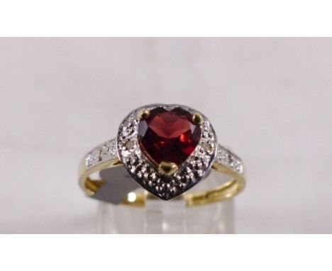 9CT DIAMOND RING. 9ct gold heart shaped garnet and diamond ring, size N/O