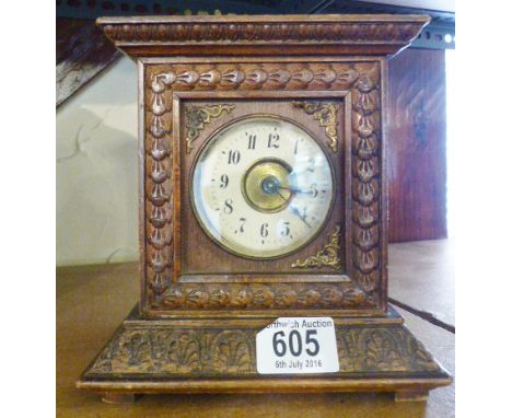 FRENCH BRACKET CLOCK. French oak bracket clock with key