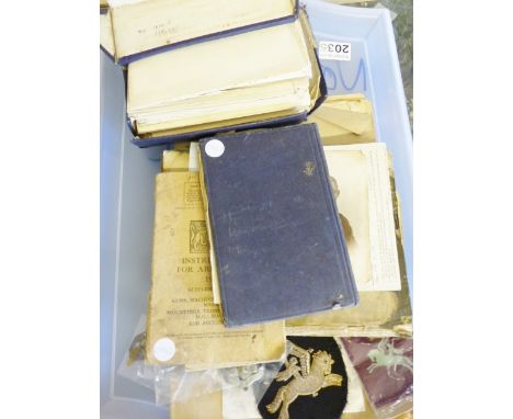 ARMY BADGES AND PHOTOGRAPHS. Badges, photographs and Army records of Pte 5186440 Philip Ikin Armourer, including diagrams of 