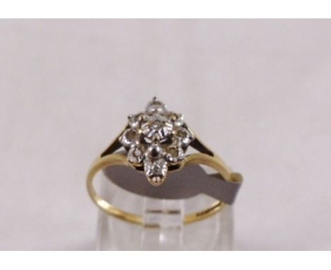 9CT DIAMOND RING. 9ct gold diamond cluster ring, size K/L