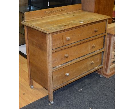 A vintage oak chest of drawers circa 1930's, with three graduated drawers, 89cm high x 91.5cm wide x 46cm deep