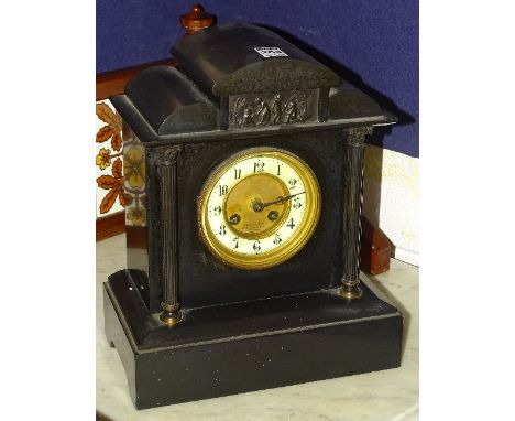 A 19th century French Parisian black slate mantel clock, retailed by Brook & Son Edinburgh, the stepped pediment with classic