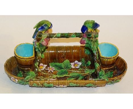 A Victorian majolica strawberry stand by George Jones, naturalistically modelled with two blue tits eating strawberries perch