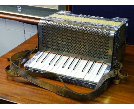 A Pietro accordion, in original blue fitted case, 33cm high x 33cm wide