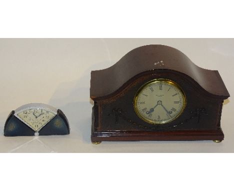 An Art Deco Swiss made eight day chrome cased travel clock circa 1930's, the dial with Arabic numerals and engraved date to r