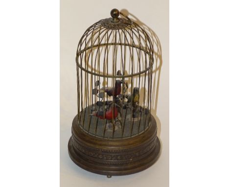 A reproduction singing bird cage automaton, with winding key and lever to underside, 31cm high