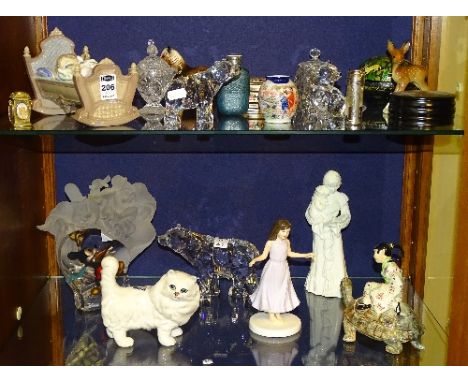 A mixed lot of porcelain and glass figures and ornaments, to include a Lladro figure group of child sleeping with doll in bed