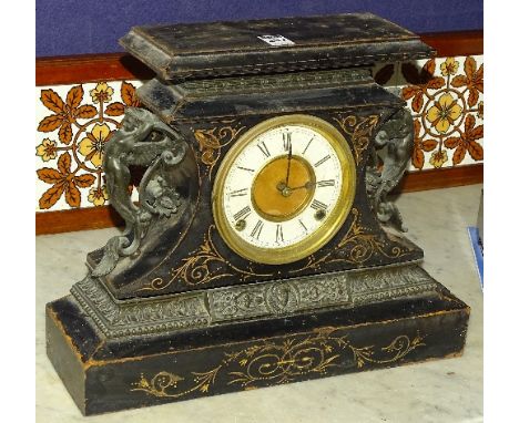 A Victorian embossed cast metal mantel clock by Ansonia Clock Co USA, decorated with cast metal handles in the form of classi