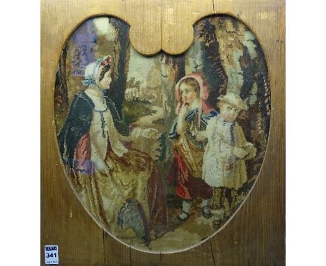 A framed carpet tapestry, featuring a mother and two children, 39 x 35cm