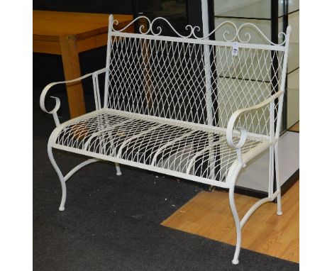 A painted metal garden bench, with lattice decoration to back rest and seat, 100cm high x 114cm wide