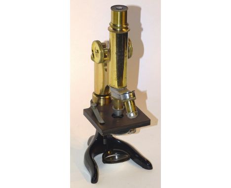 A vintage brass mounted microscope by E.Leitz-Wetzlar, no.103103, in fitted box, stamped for retailer Neville & Hunter, Edinb