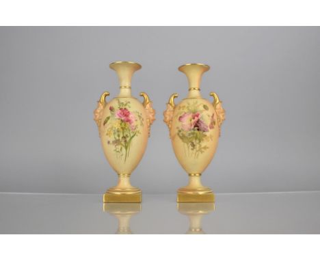 A Pair of Royal Worcester Blush Ivory Vases decorated with Floral Bursts to Body and with Satyr Mask Handles on Square Bases,