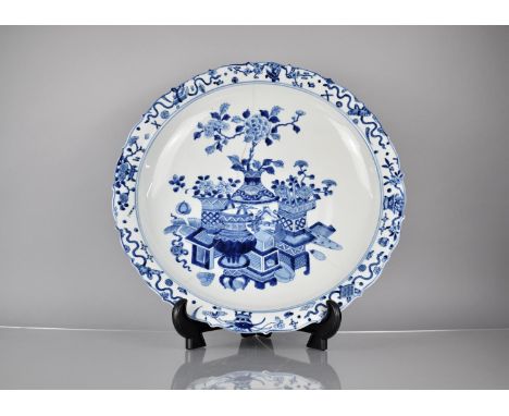 A Large Chinese Porcelain Blue and White Charger decorated with Antique Vases of Flowers, Precious Objects Etc with Shaped Ri