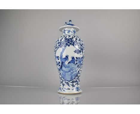 A 19th Century Chinese Porcelain Blue and White Baluster Vase and Cover Decorated with Quatrefoil Cartouche Depicting Love Bi