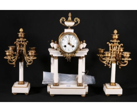 Late 19th century French marble and ormolu clock garniture with eight day movement chiming on a bell, enamel dial and floral 