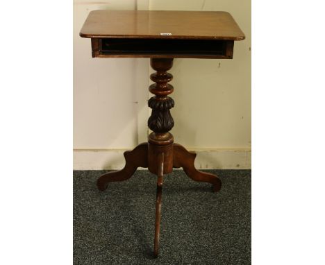 Victorian mahogany side table, the rounded rectangular top over frieze drawer, raised on acanthus carved turned columns, trip