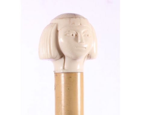 Malacca cane with ivory finial in the form of a carved female head. 90cm