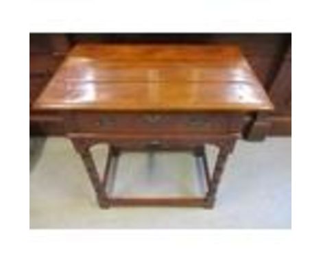 A modern early 18th century style, walnut low boy having a long drawer, raised on bobbin turned legs, 28" x 30" x 19" 