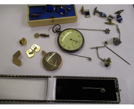 A mixed lot of jewellery to include a pair of 9ct gold cuff links, a pocket watch, stick pins and other items 