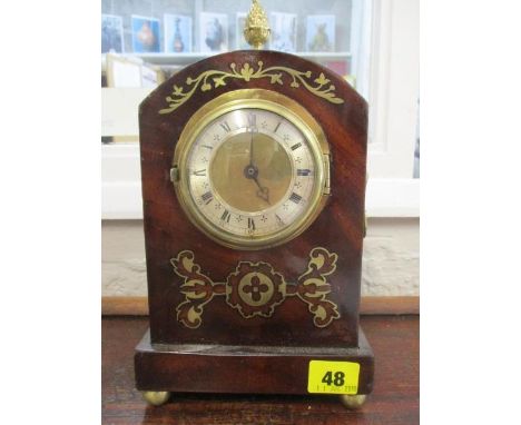 A 19th century and later small mahogany and brass inlaid mantle clock, having acorn finial and cylinder movement, 10 1/2" h 