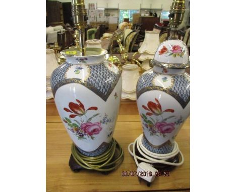 A pair of late 20th century Oriental style ceramic table lamps decorated with flora 