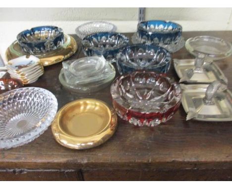 A selection of glass and ceramic ashtrays 