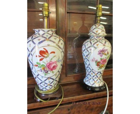 A pair of late 20th century Oriental style ceramic table lamps decorated with flora 